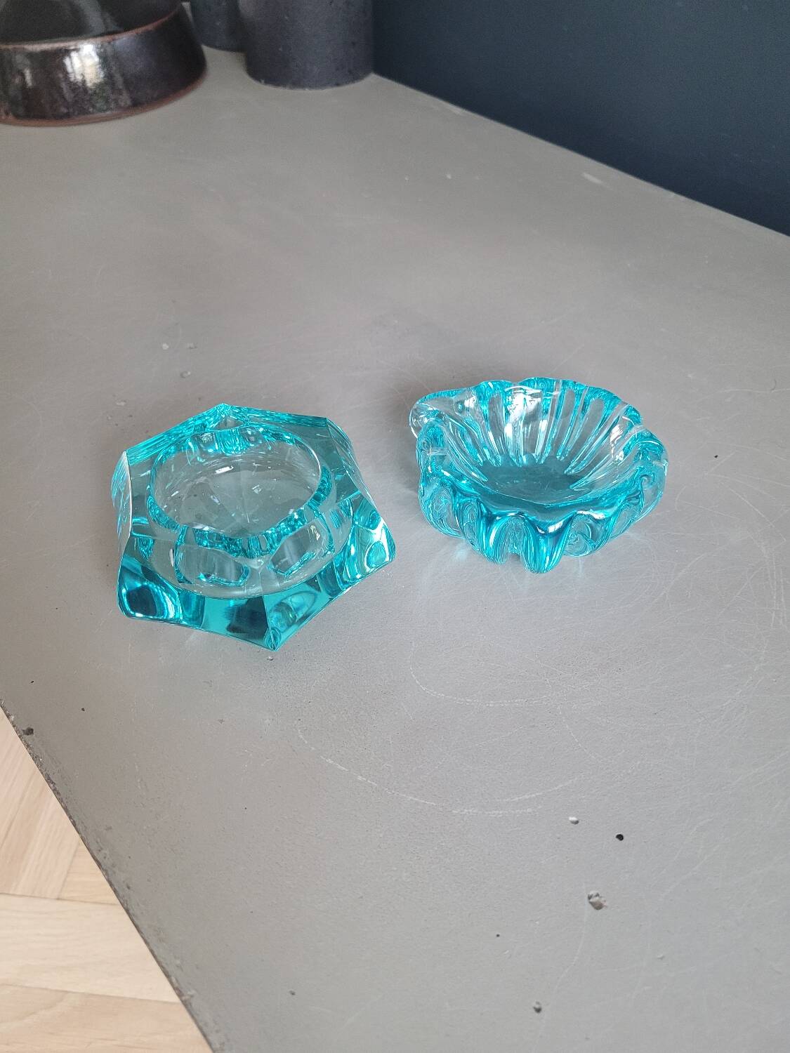 Set of 2 assorted turquoise glass ashtrays