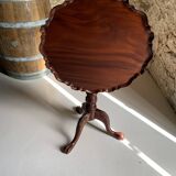 A pair of reclining side tables.