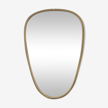 Asymmetrical free-form mirror from the 60s and 70s