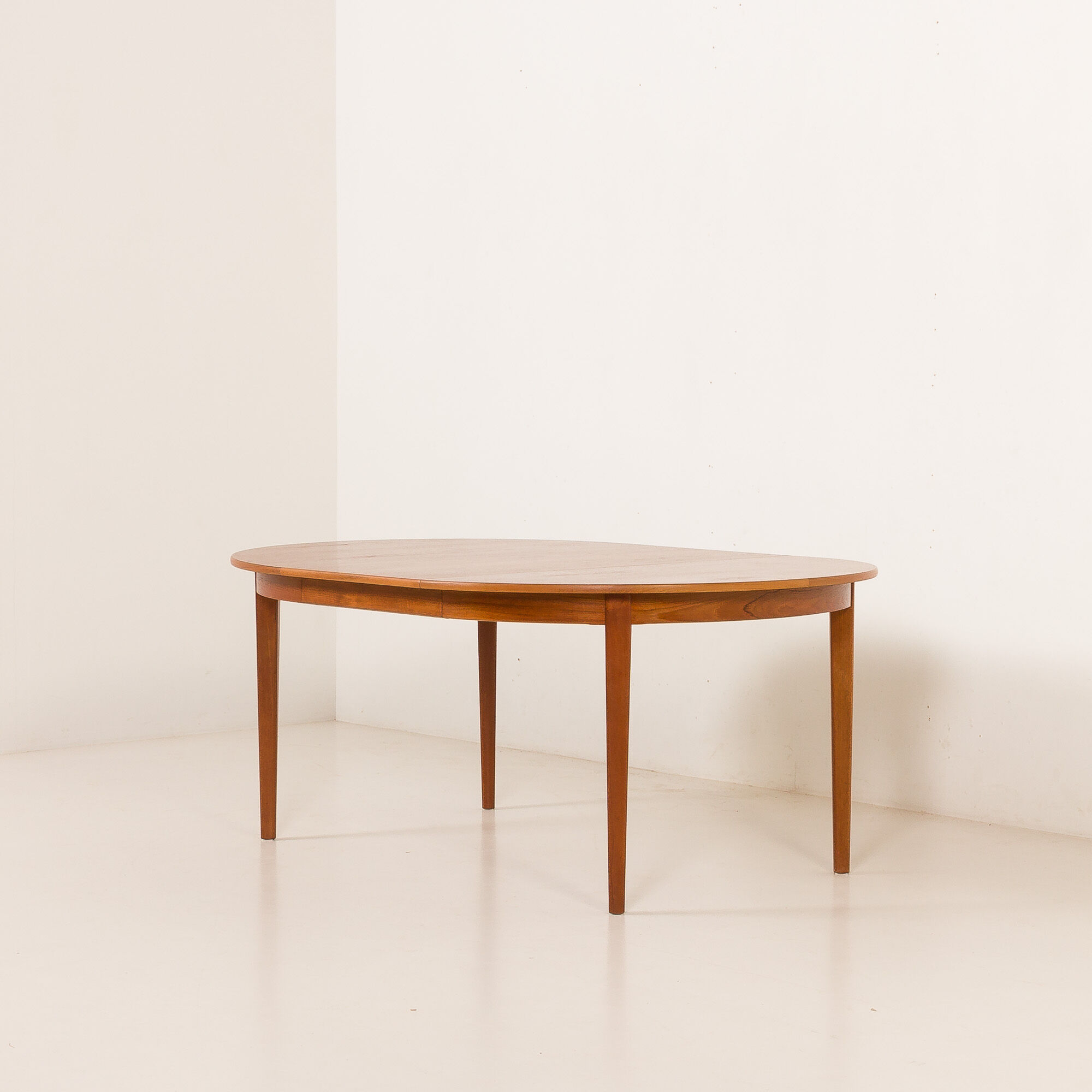 Henning Kjaernulf attributed extra large teak table with 4 inner leaves for Soro, Denmark 1960s