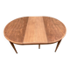 Renovated round extendable dining table made of solid mahogany from the 19th century.