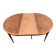 Renovated round extendable dining table made of solid mahogany from the 19th century.