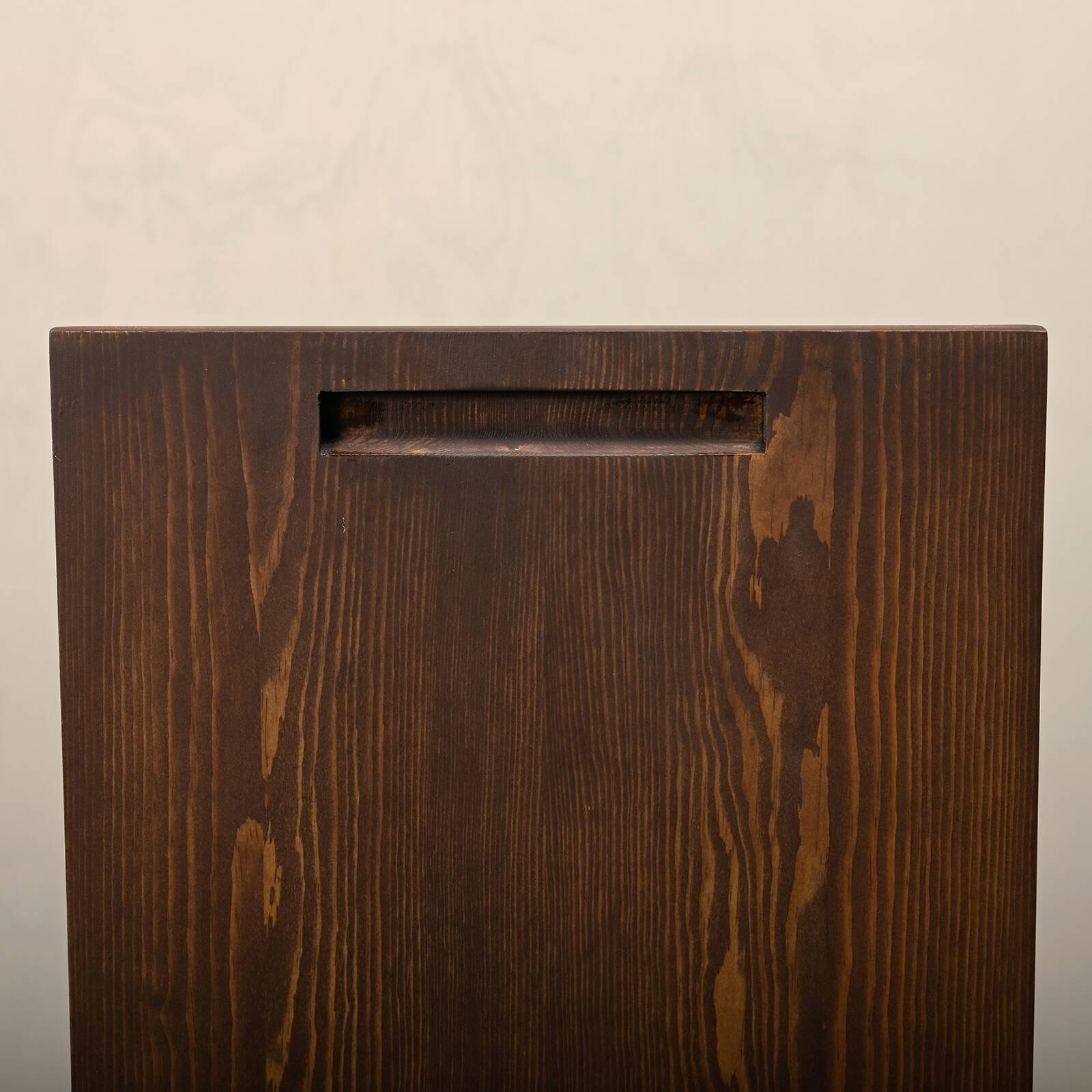 Gerrit Rietveld Zig Zag Chair is dark brown stained wood