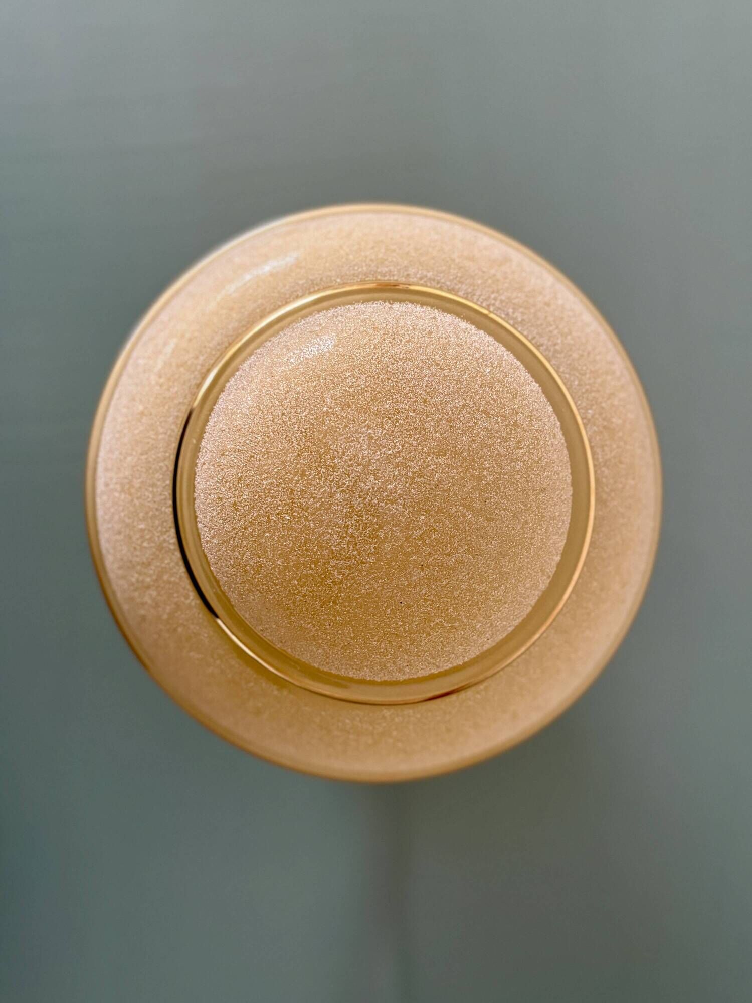 Vintage Art Deco globe wall/ceiling light in frosted yellow and gold glass.
