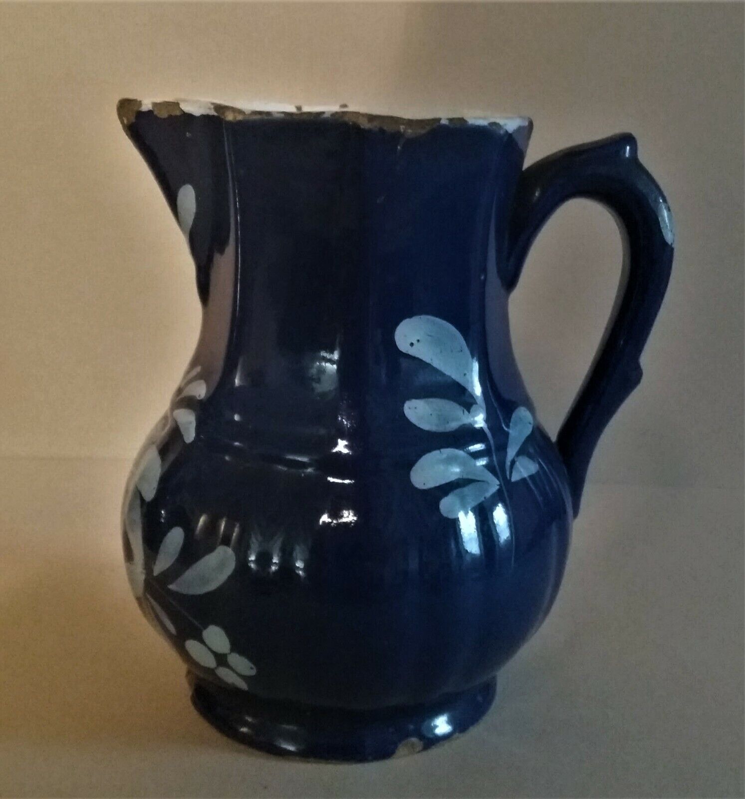 East earthenware pitcher covered blue XIXth