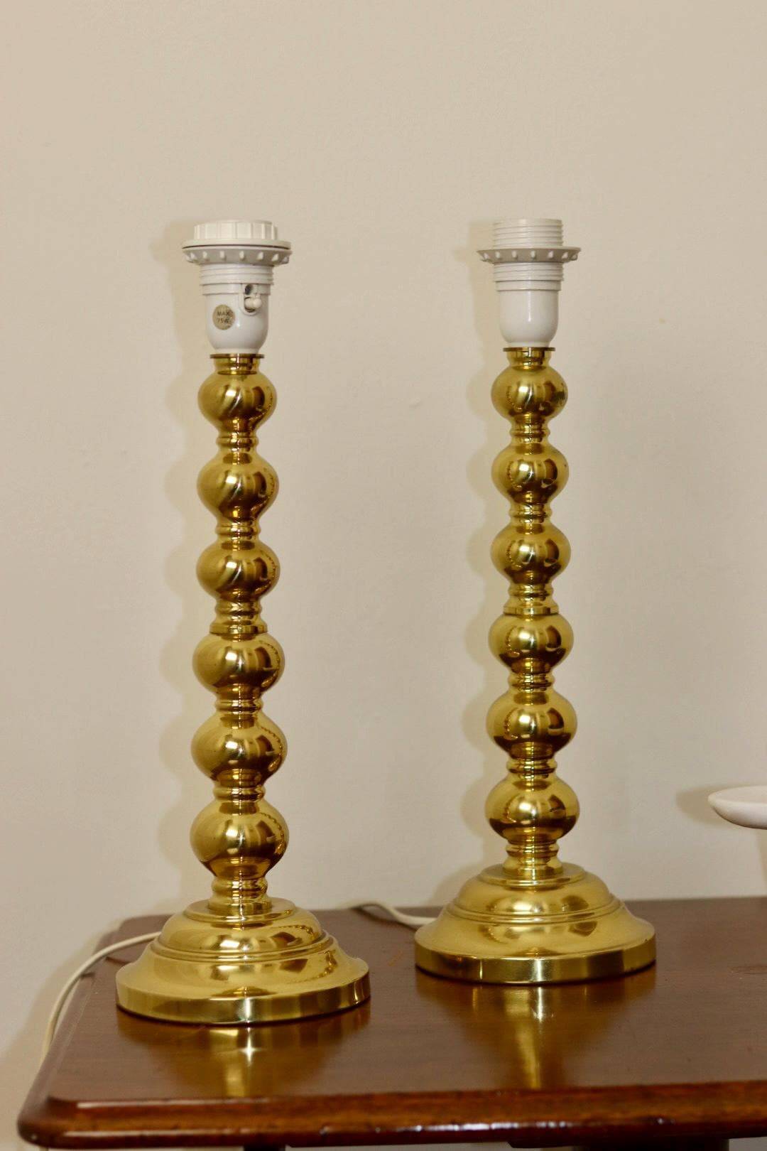 Pair of Swedish brass lamps from the mid-century.