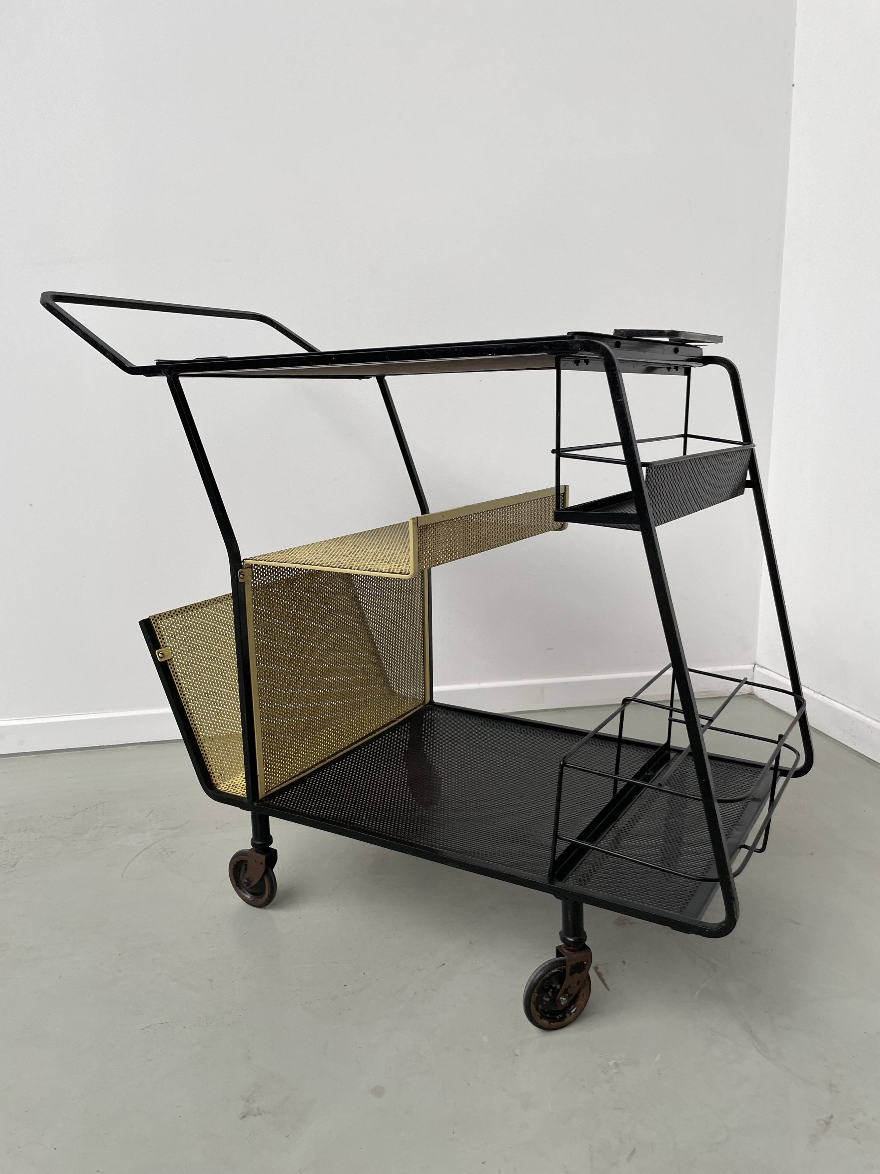 Perforated metal serving trolley in the Mathieu Matégot style