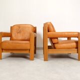 2 fauteuils en chêne et cuir cognac par Skilla