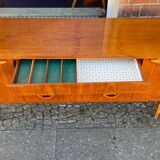 Atypical teak row from the 60s