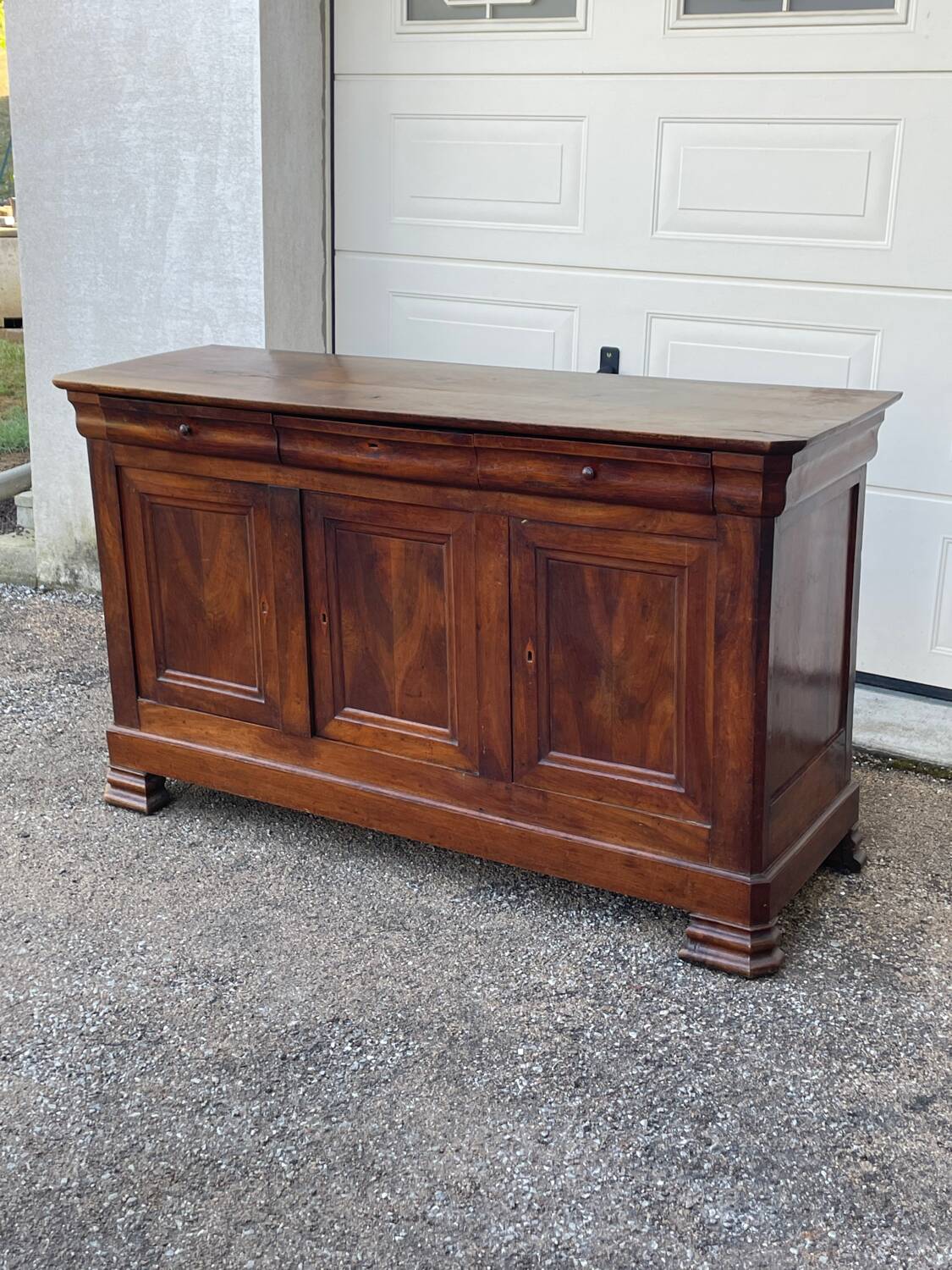 Walnut sideboard, Louis Philippe style, three doors, three shelves