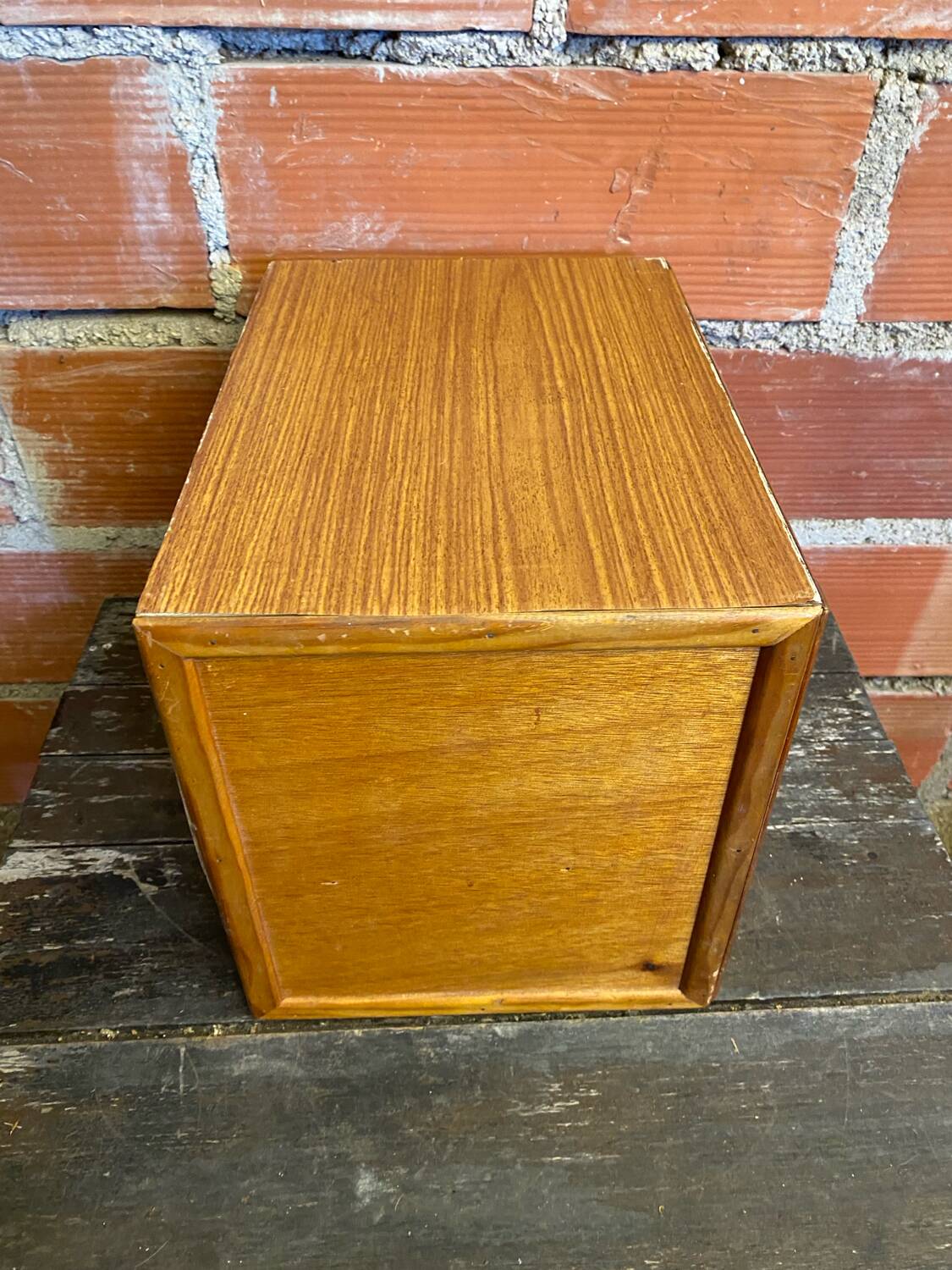 Vintage wooden storage cabinet with shelves