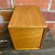Vintage wooden storage cabinet with shelves