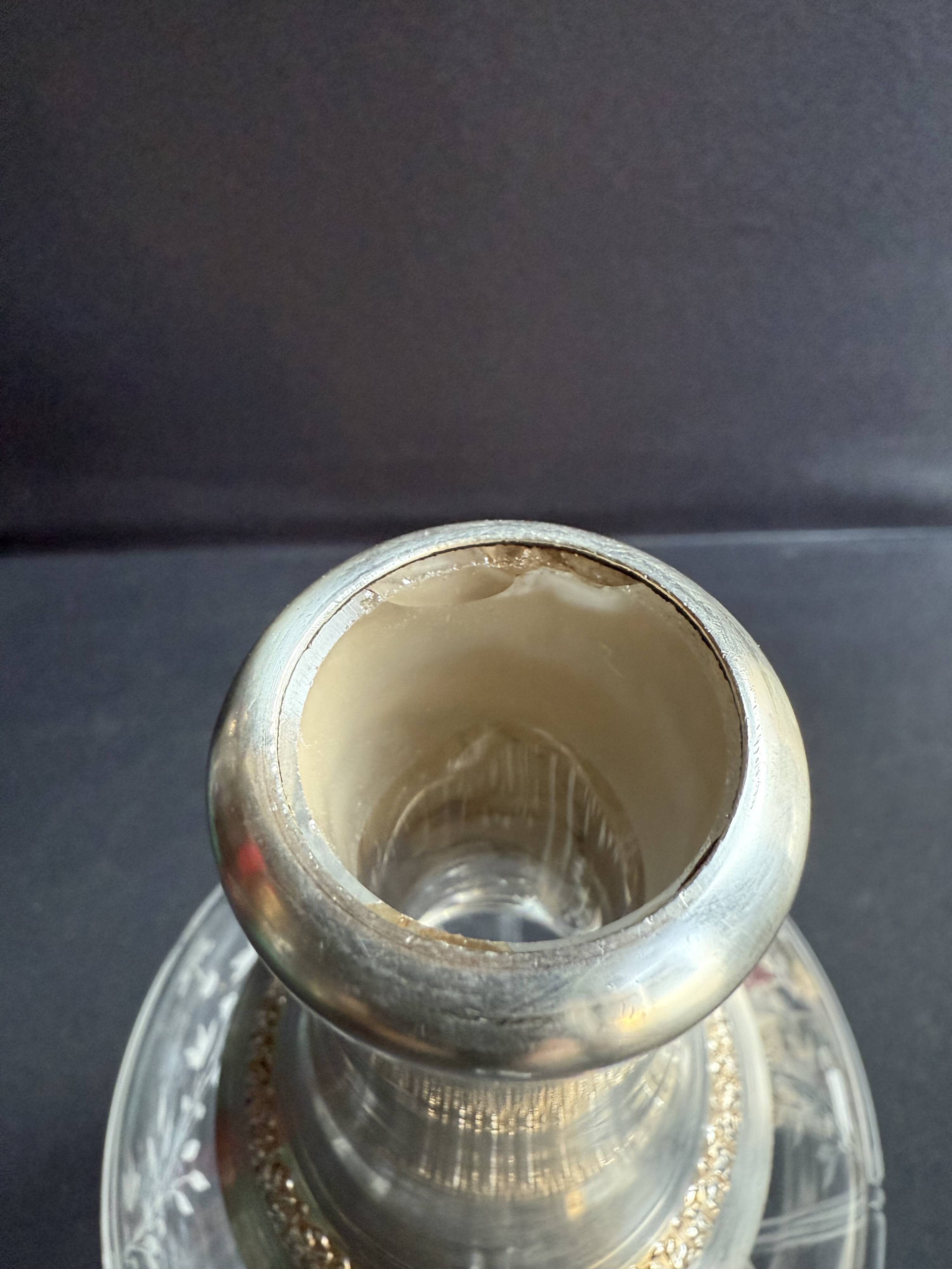 Cut crystal carafe with silver frame