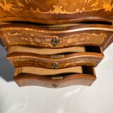 Curved secretary and inlaid with floral branches in Louis XV style