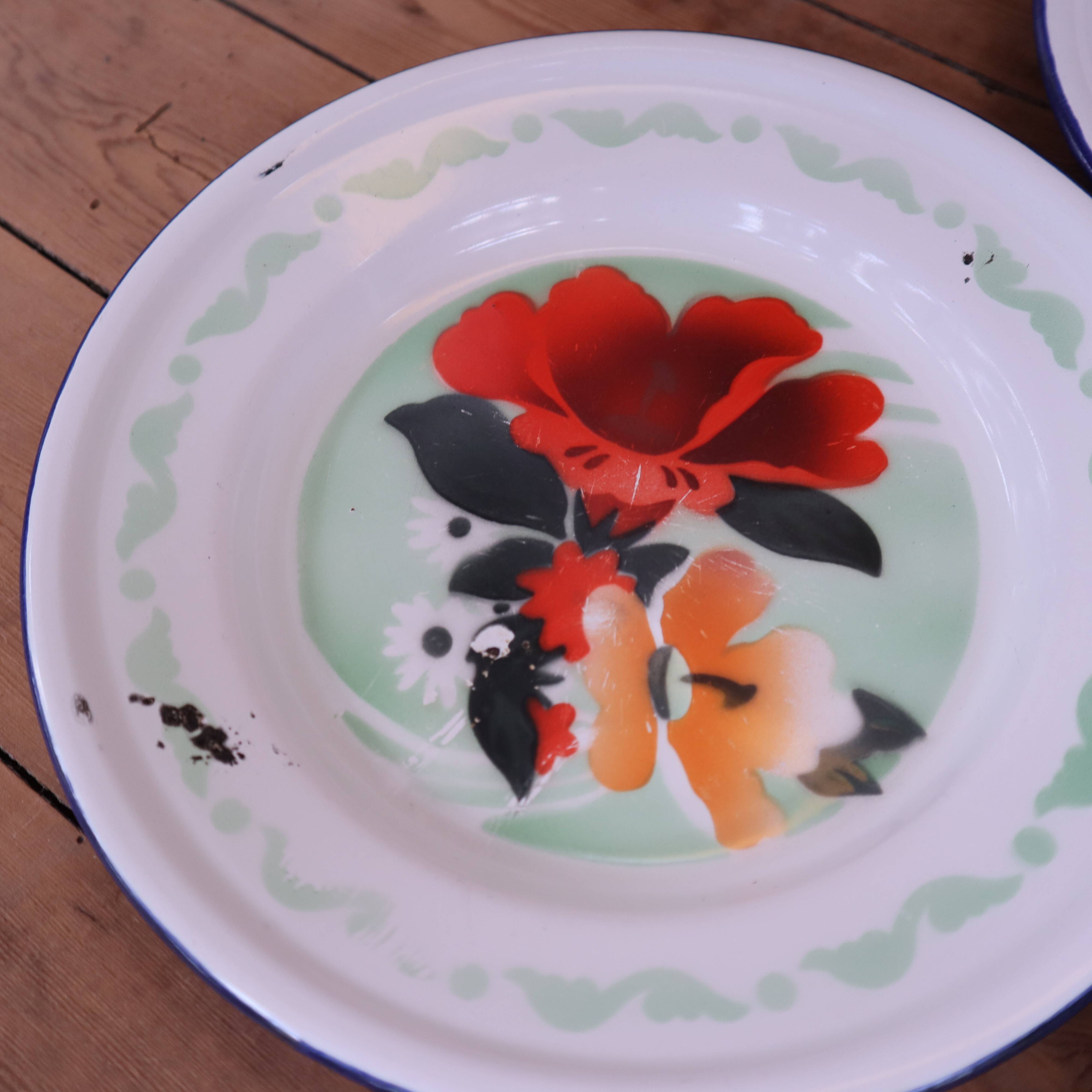 7 printed floral enamel plates "bon voyage" Made in China