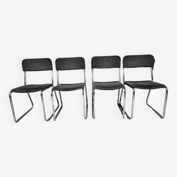 Set of four vintage 1970 sled chairs