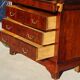 Antique mahogany chest of drawers with white marble.