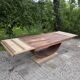 Renovated wooden table with extensions.