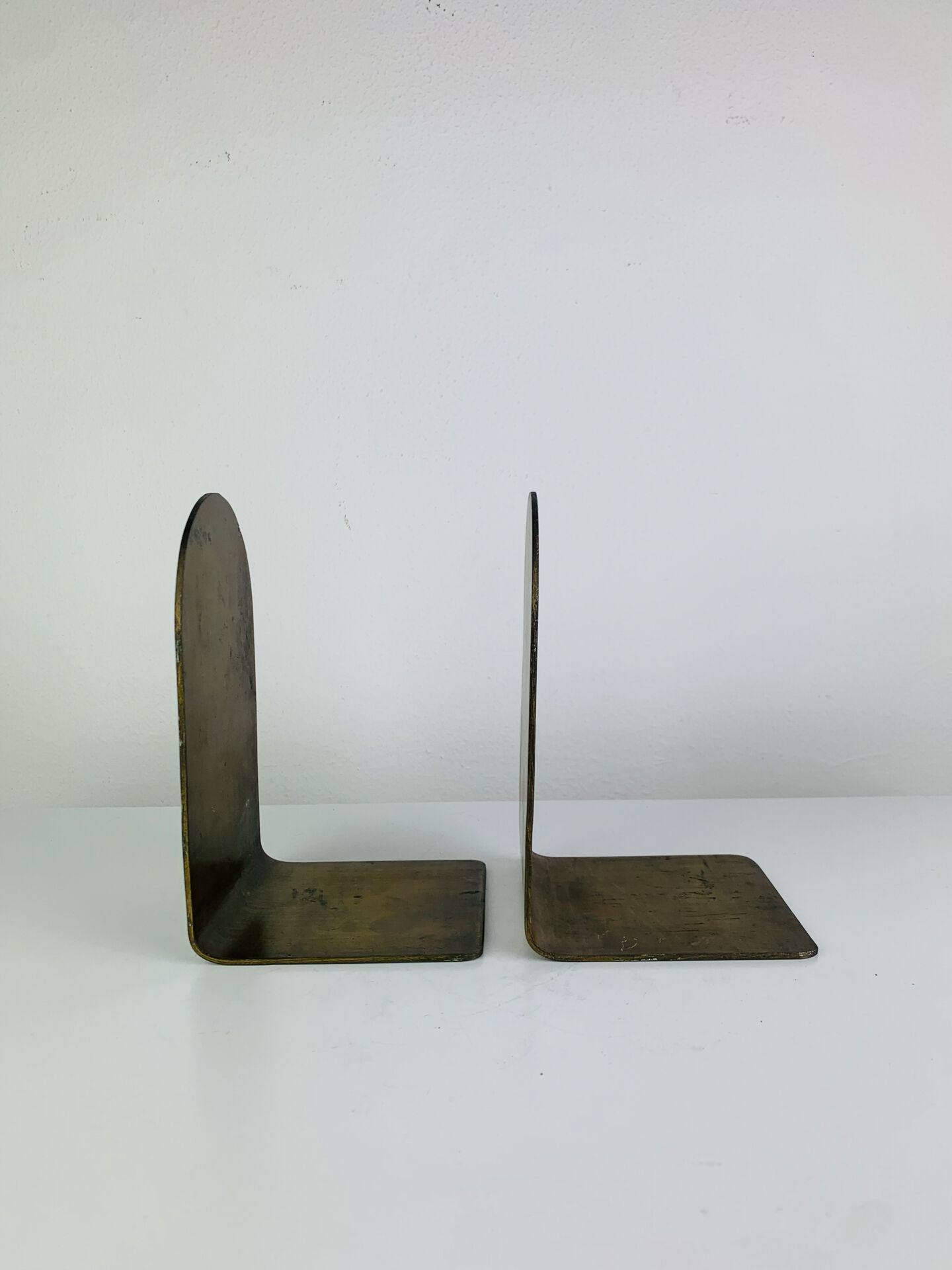 Pair of minimalist vintage raw brass bookends