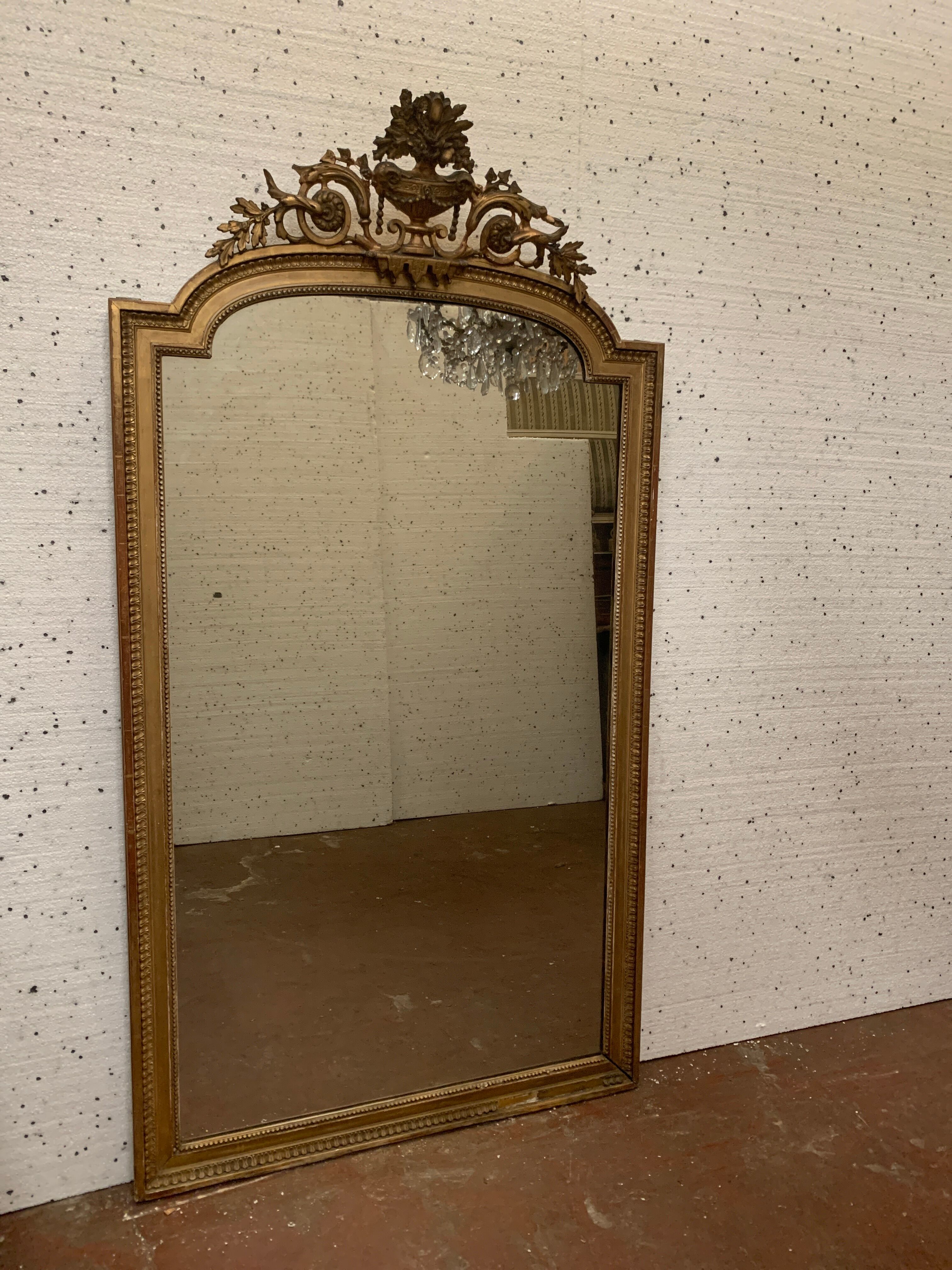 Louis XVI style mirror in wood and gilded stucco XIX century
