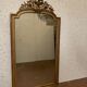 Louis XVI style mirror in wood and gilded stucco XIX century