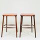 Bar stools matching the vintage style, in pink corduroy.