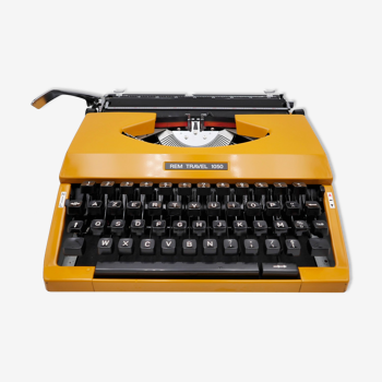 Machine à écrire Rem Travel 1050 curry révisée ruban neuf