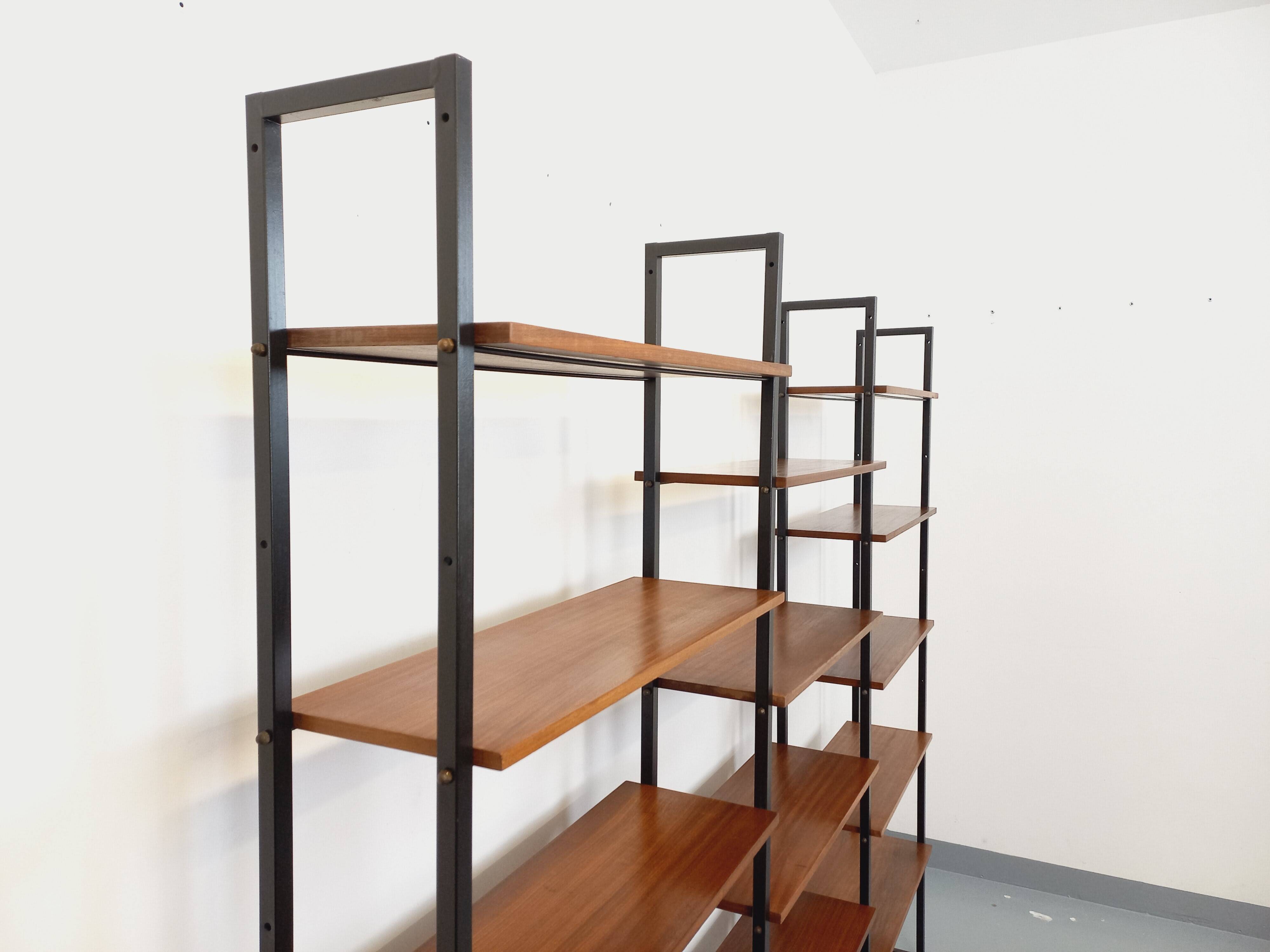 Vintage Italian triple modular bookshelf in teak and metal.