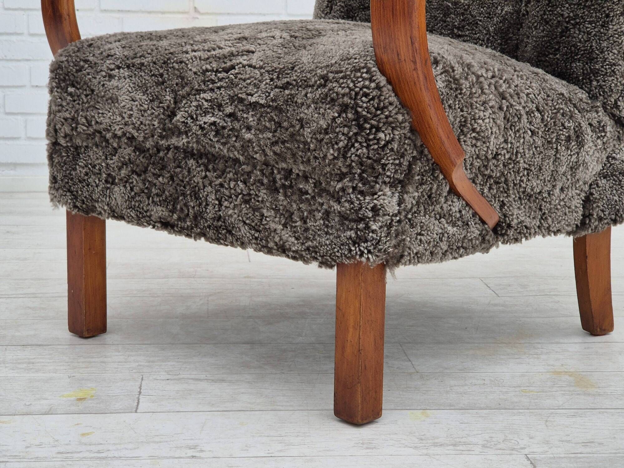 1950s, Danish design, reupholstered armchair, genuine sheepskin "Wellington".