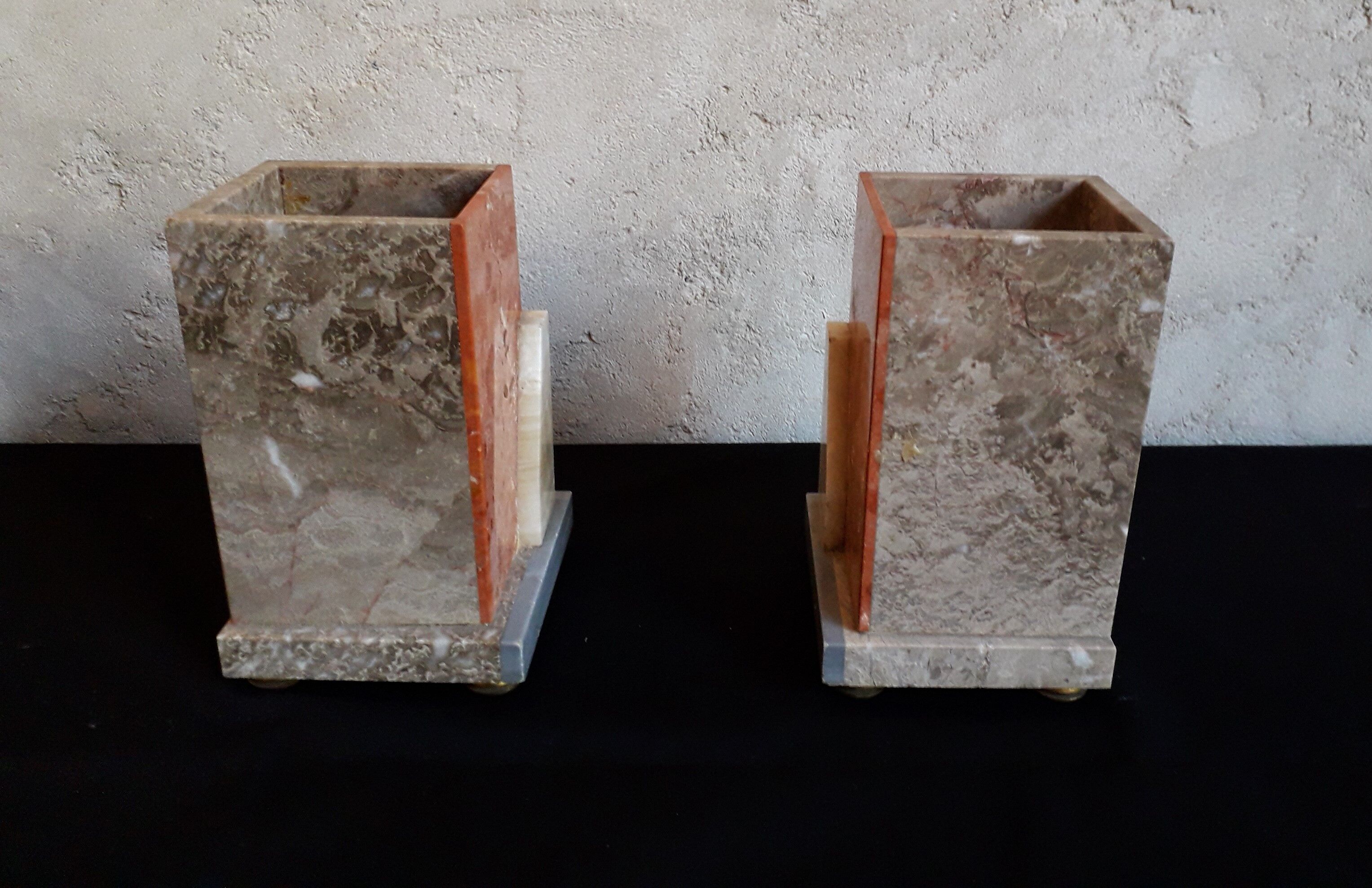 Pair of marble and onyx book clamts