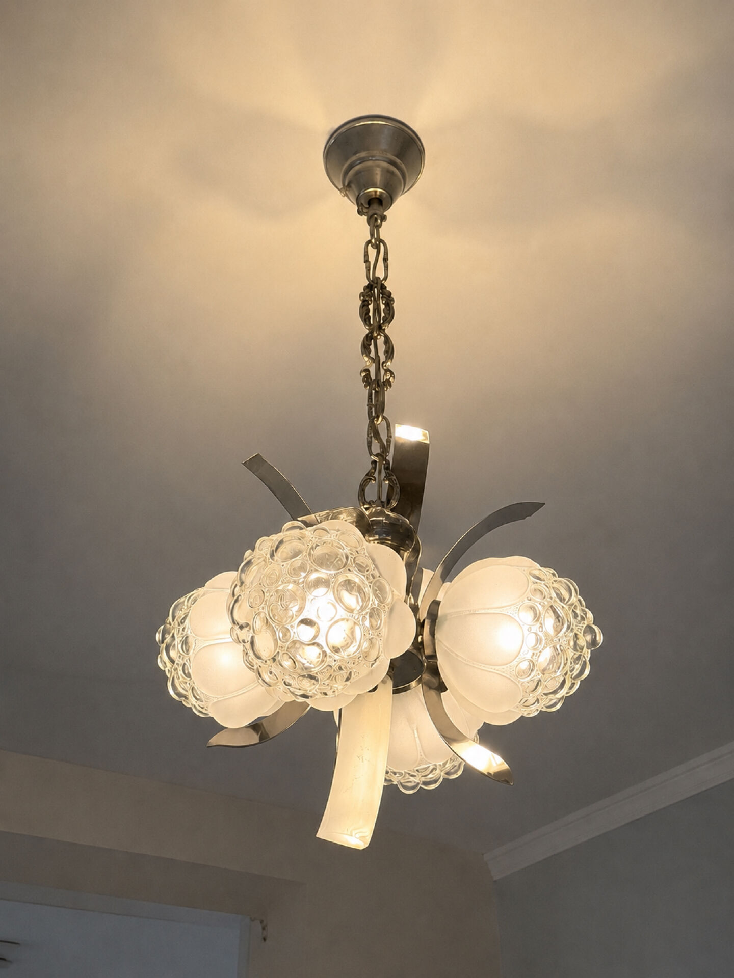 Vintage chandelier with 4 glass bubble globes and silvered metal.