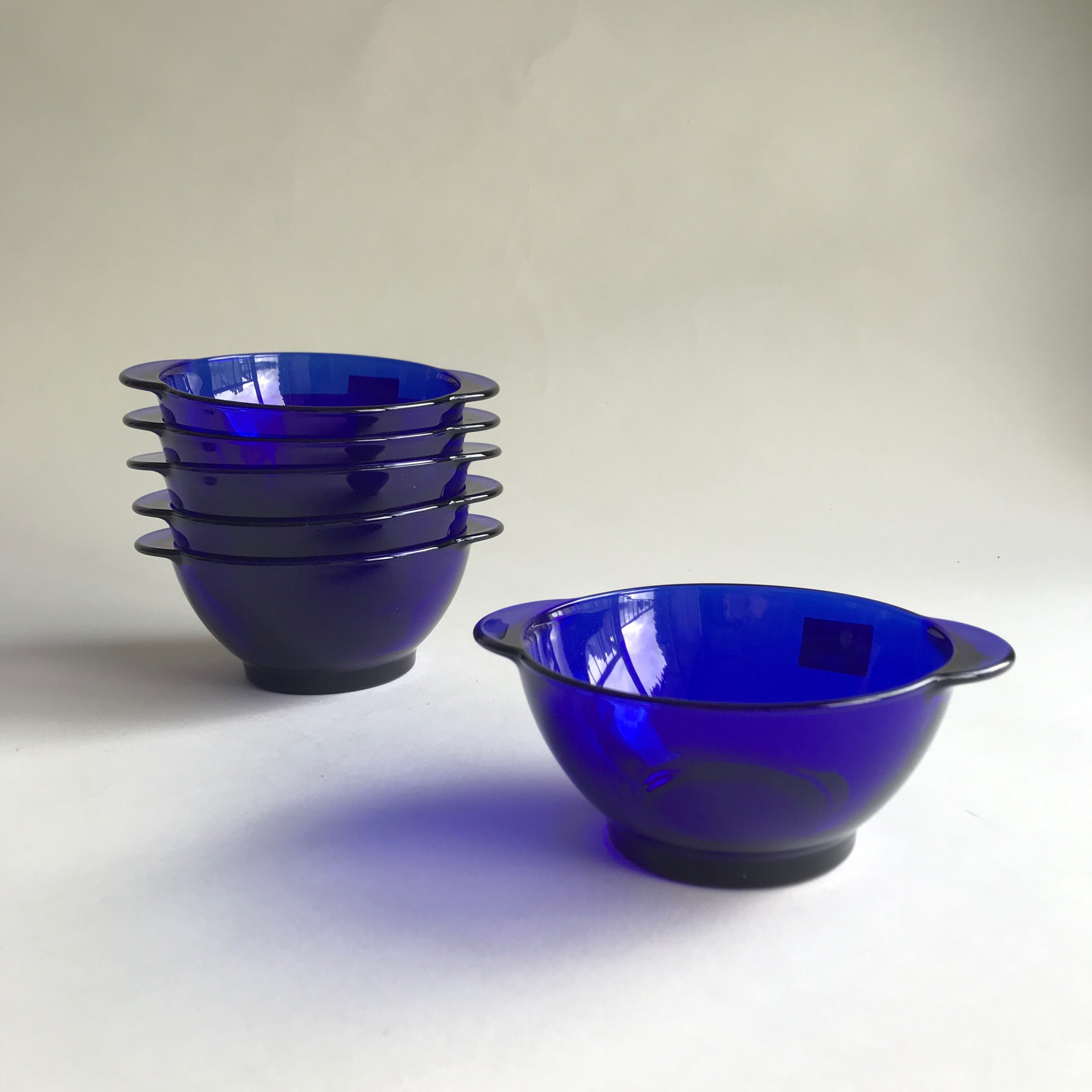 Six blue Duralex ear bowls