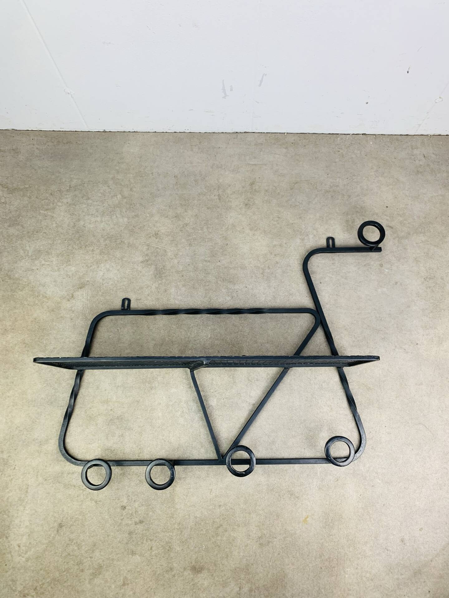 Wall-mounted coat rack/wardrobe from the 1950s, wrought iron and rigidule.