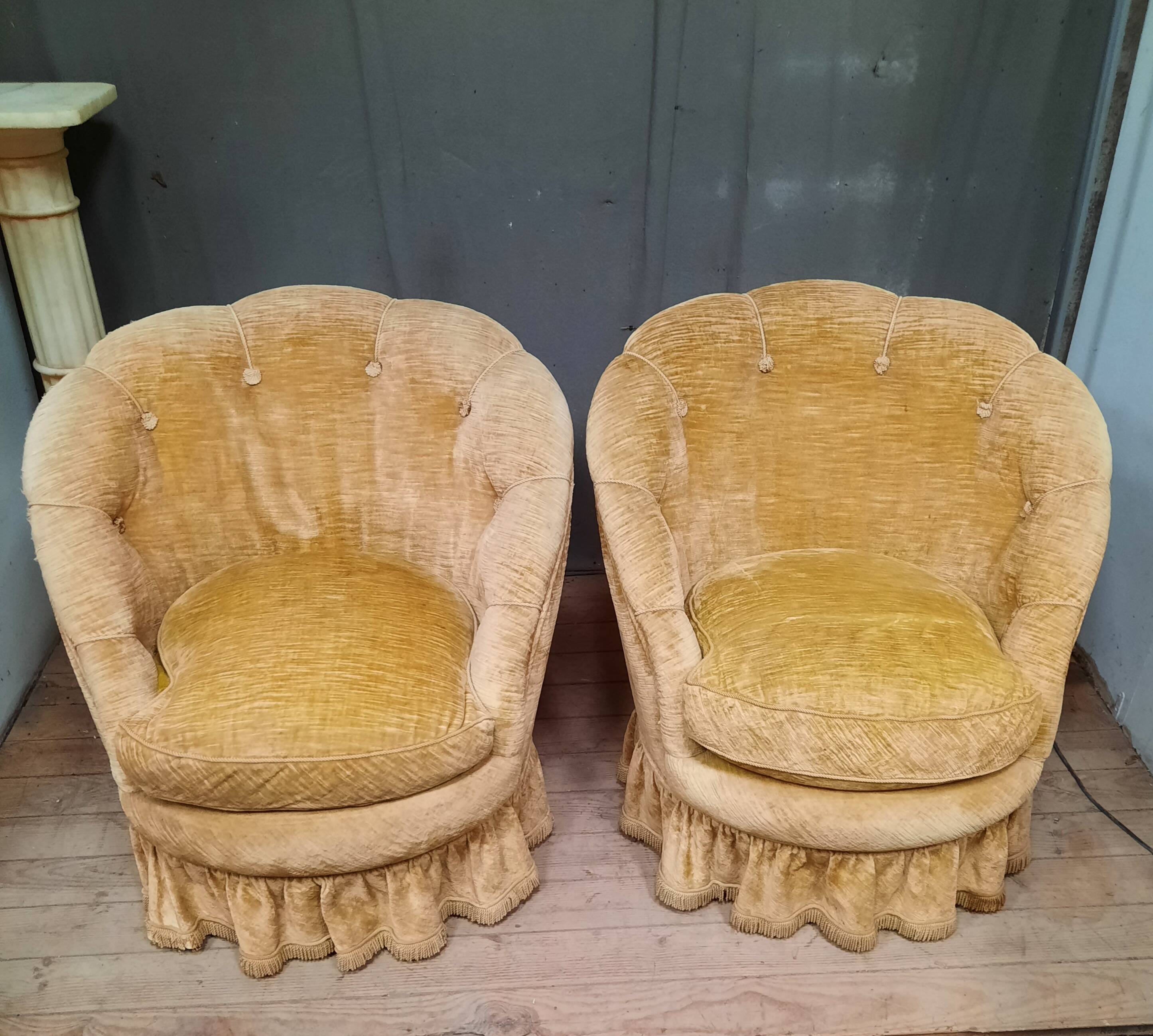 Pair of flared back toad armchairs