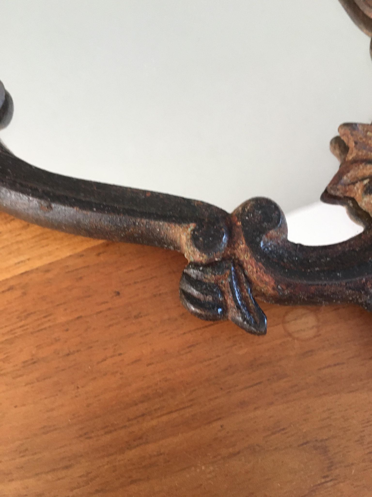 Vintage fiddle mirror to put down.