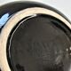 Black ceramic ashtray and vintage gold 50/60