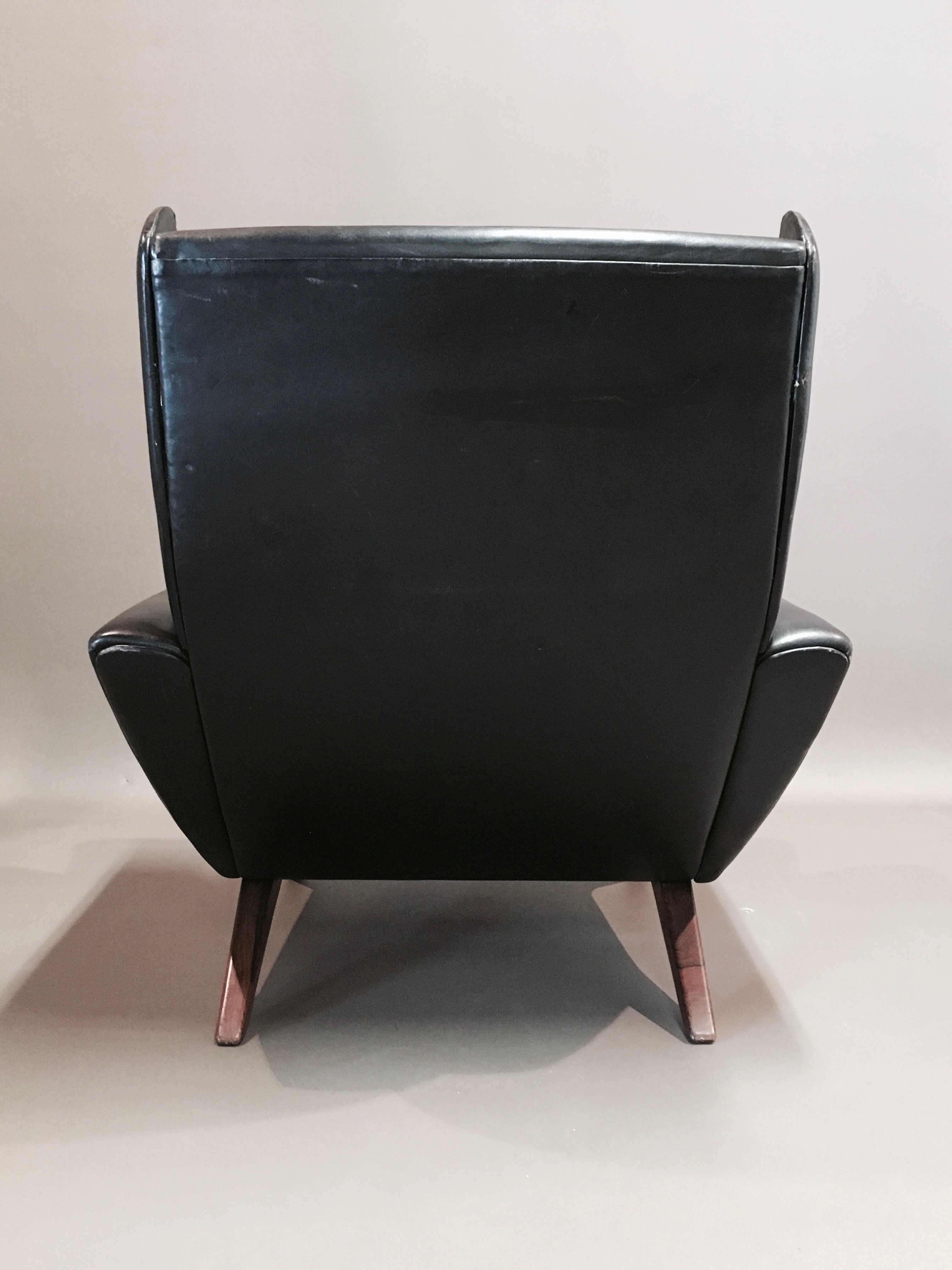 Rosewood armchair and black leather scandinavian 1950