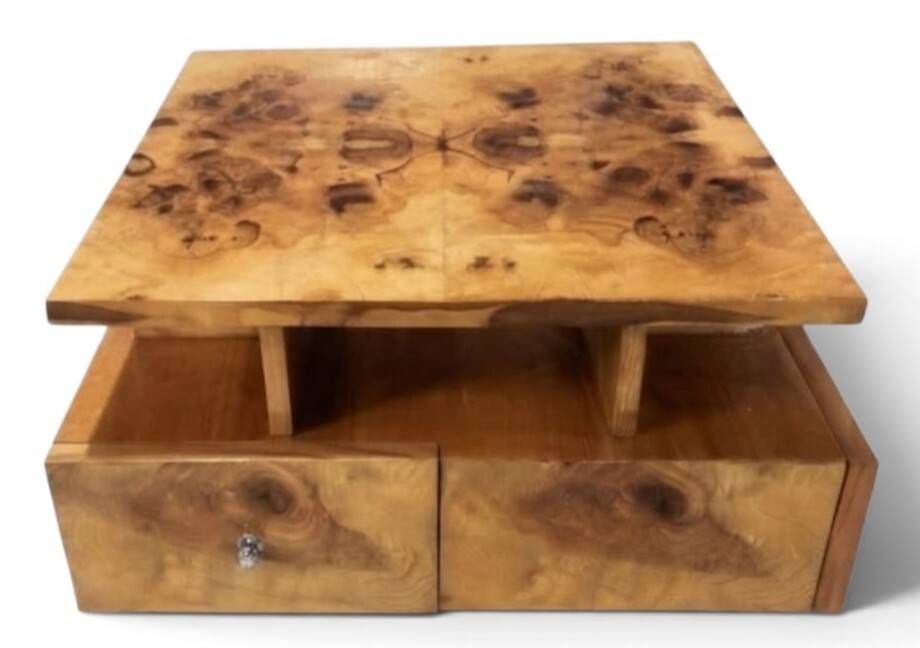 An Art Deco coffee table made of beech wood and elm burl with drawers.