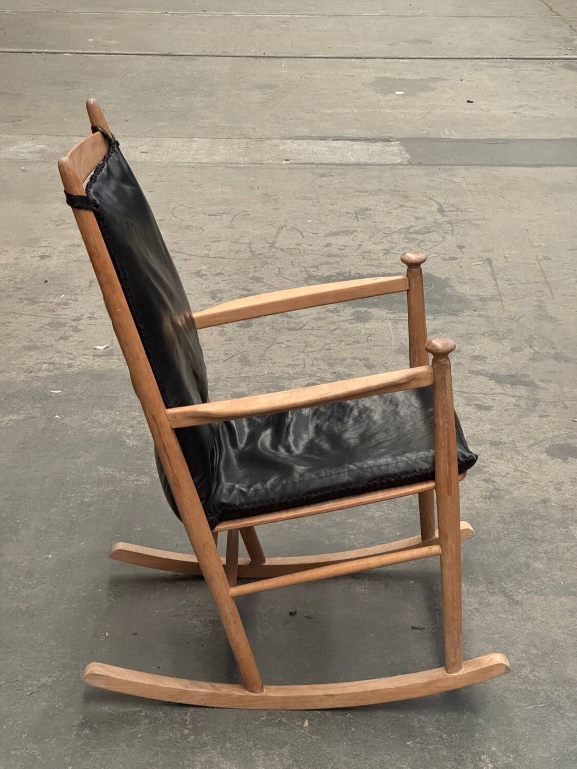 Scandinavian wooden and leather rocking chair