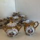 Gold Italian porcelain service. Coffee cups - sugar - cream pot / Gallant scene