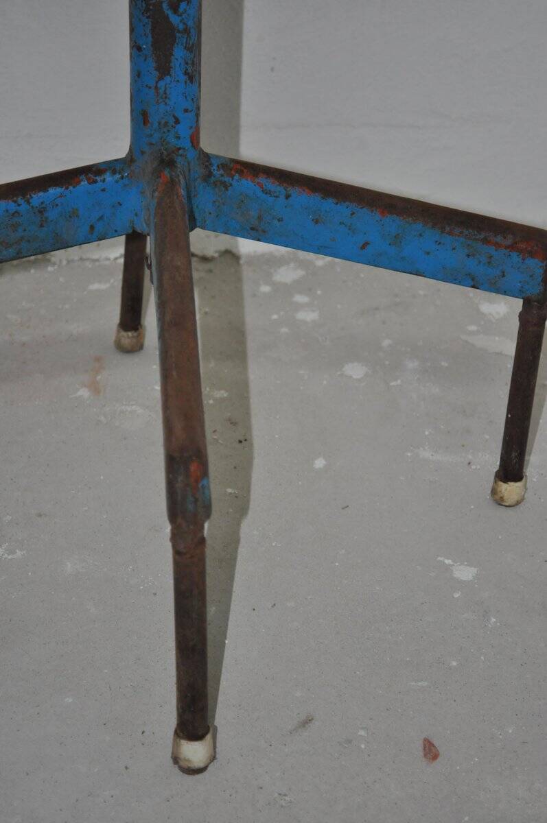 Mid-century industrial chair in metal, leather, and multicoloured wood from the 1960s.
