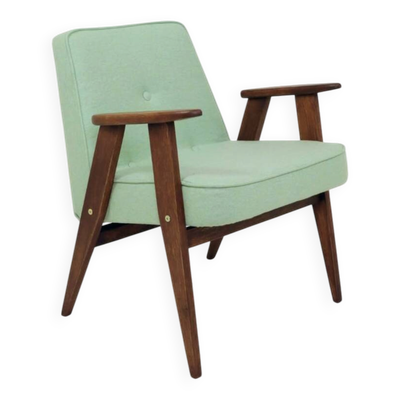 Fauteuil scandinave en tissu en laine pastel pistache, bois de chêne.