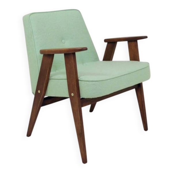 Fauteuil scandinave en tissu en laine pastel pistache, bois de chêne.