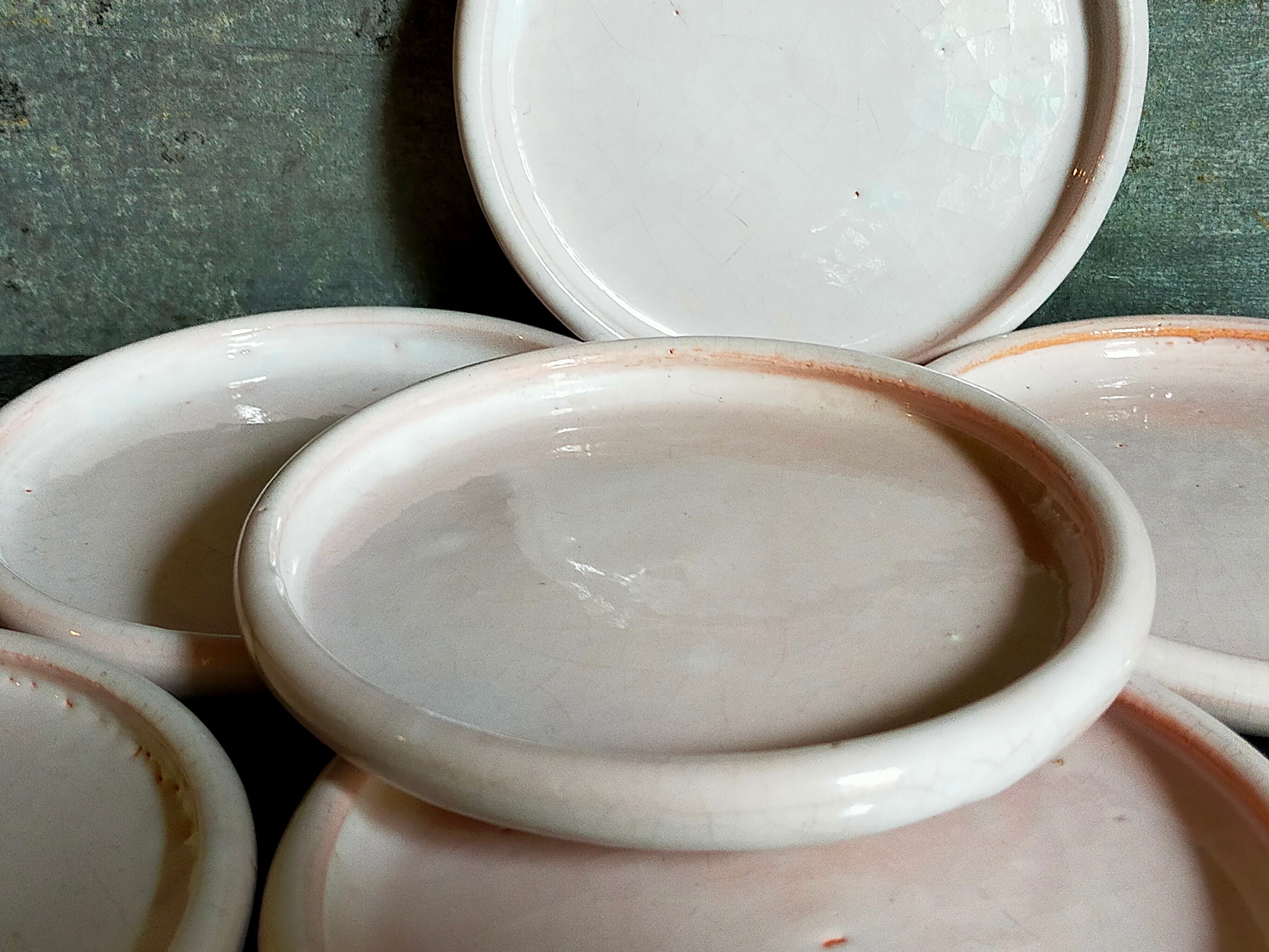 Six antique enamelled earth cut-cups