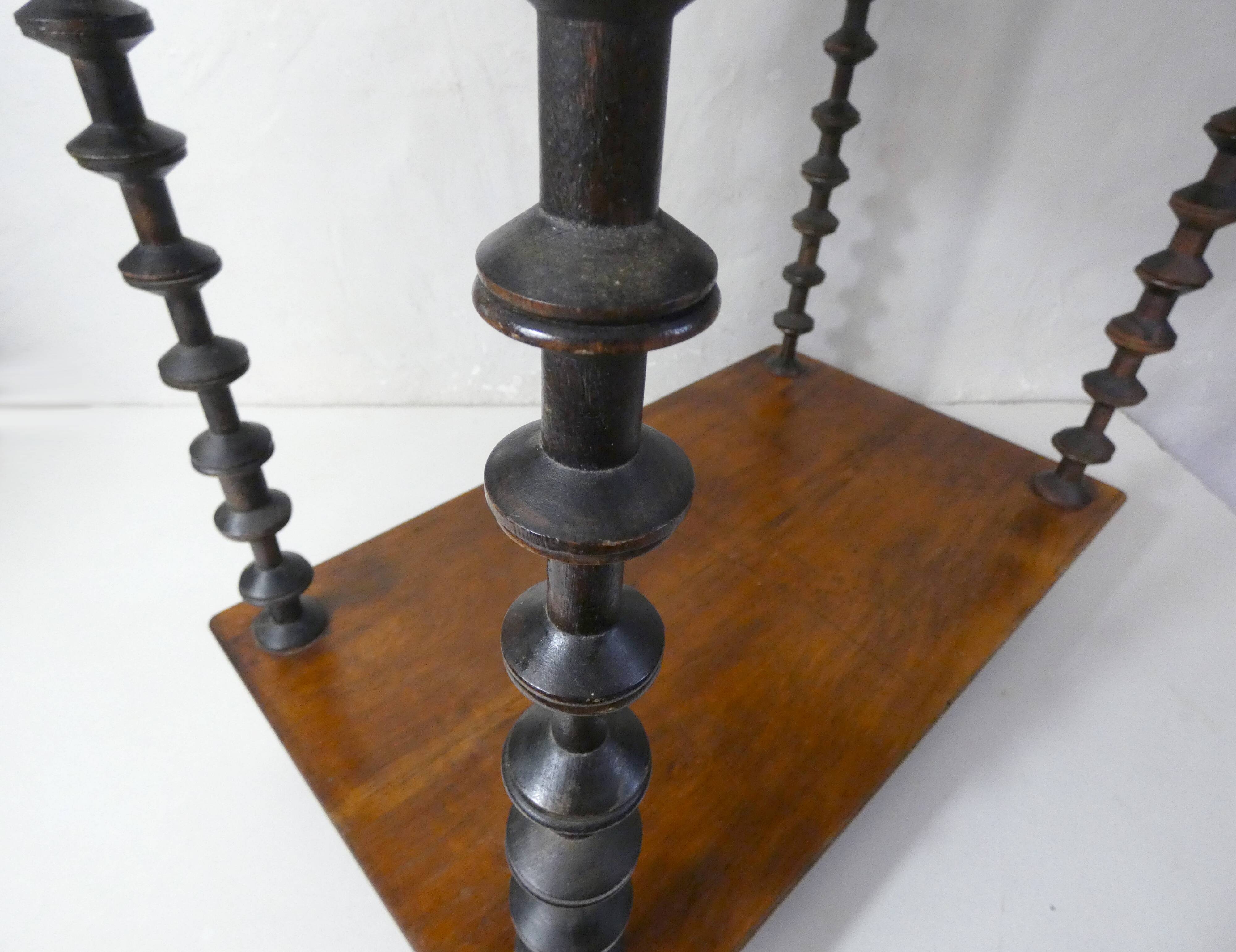 Antique wooden shelf with DMC spools – Industrial sideboard