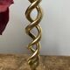 Twisted brass candle holder