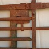 Old riveted metal gate