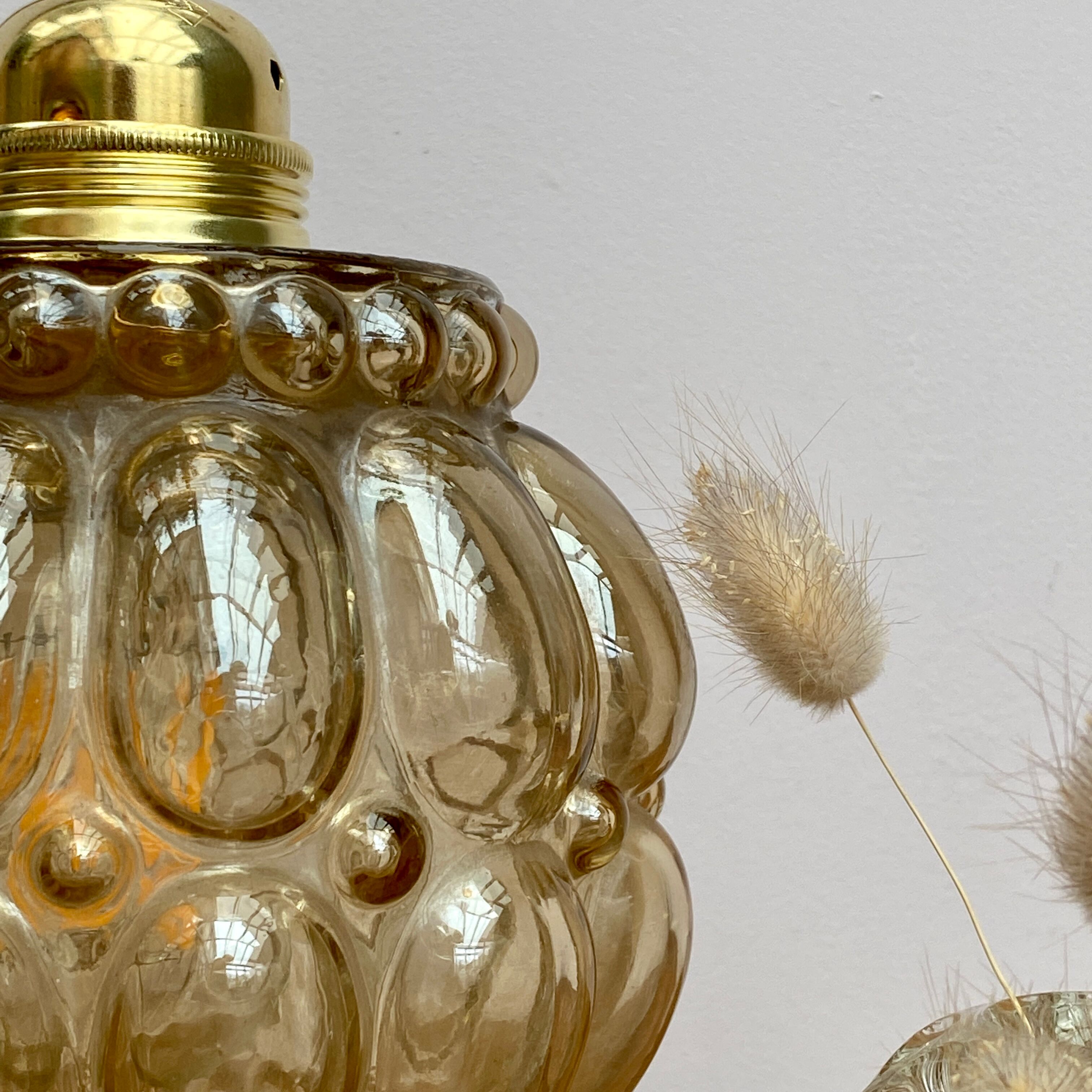 Vintage amber glass globe walker