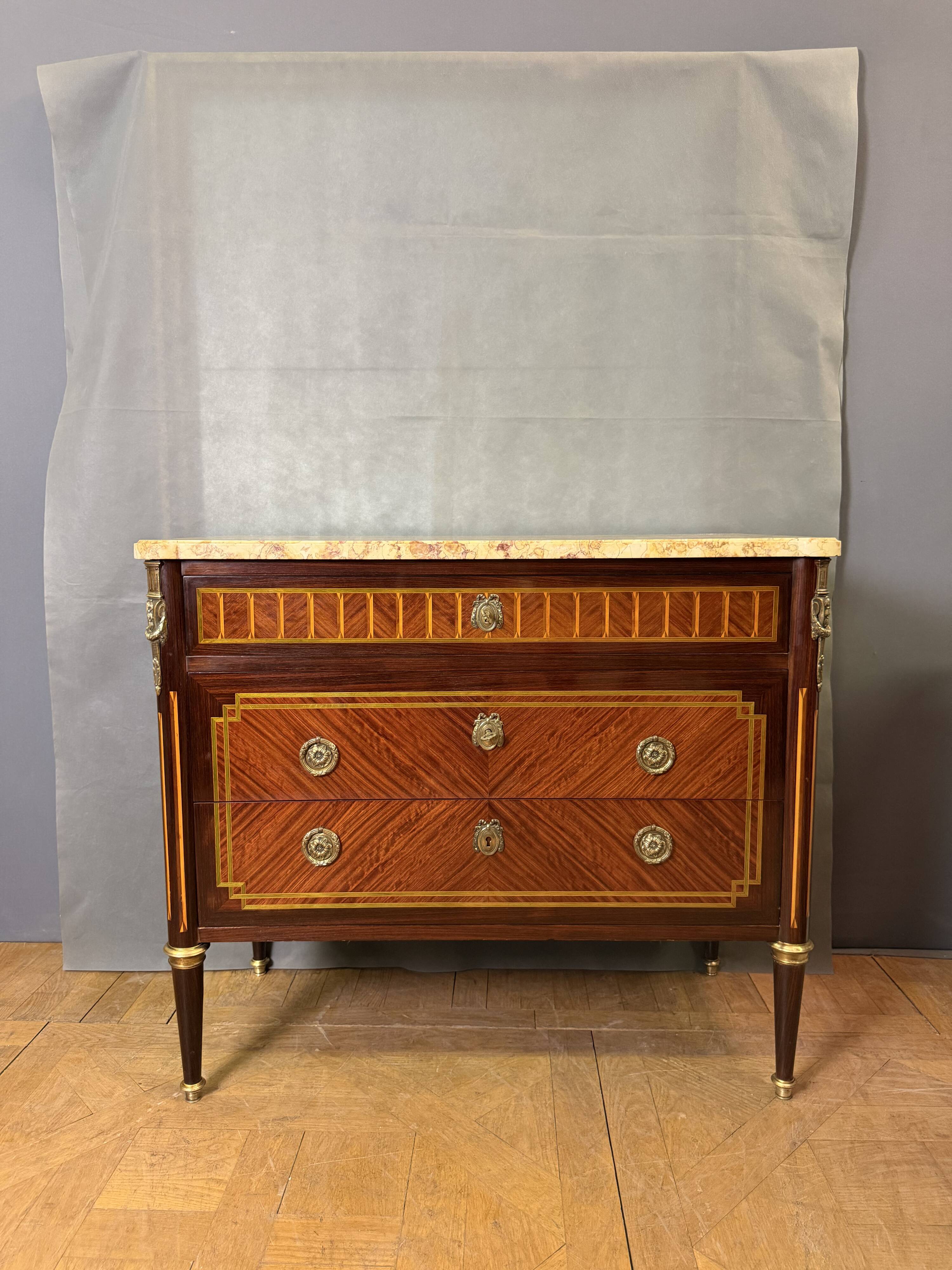 Louis XVI commode from the late 19th century.