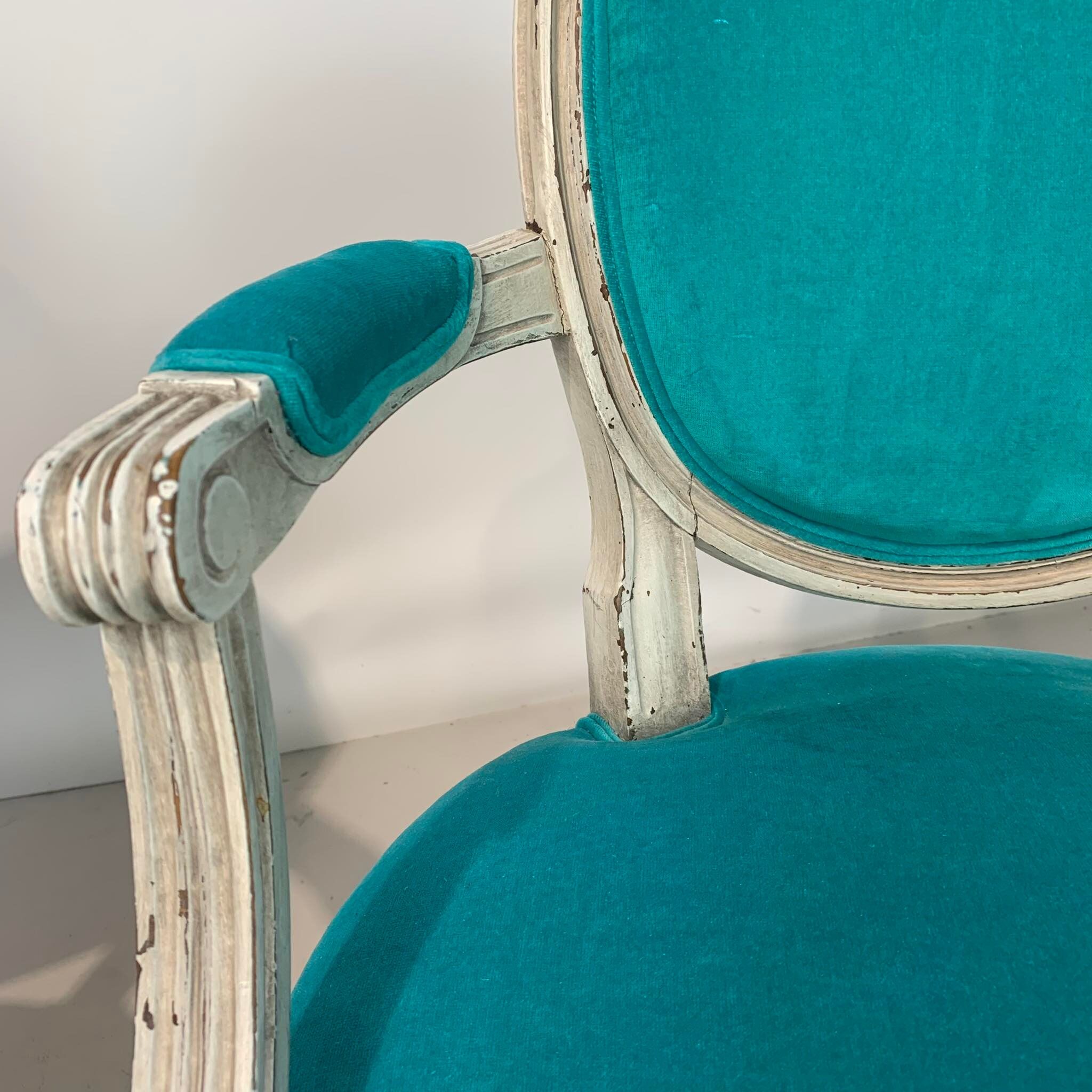 Pair of Louis XVI convertible armchairs